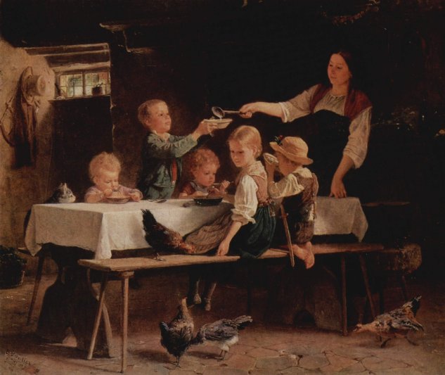  Kinder beim Mittagessen
